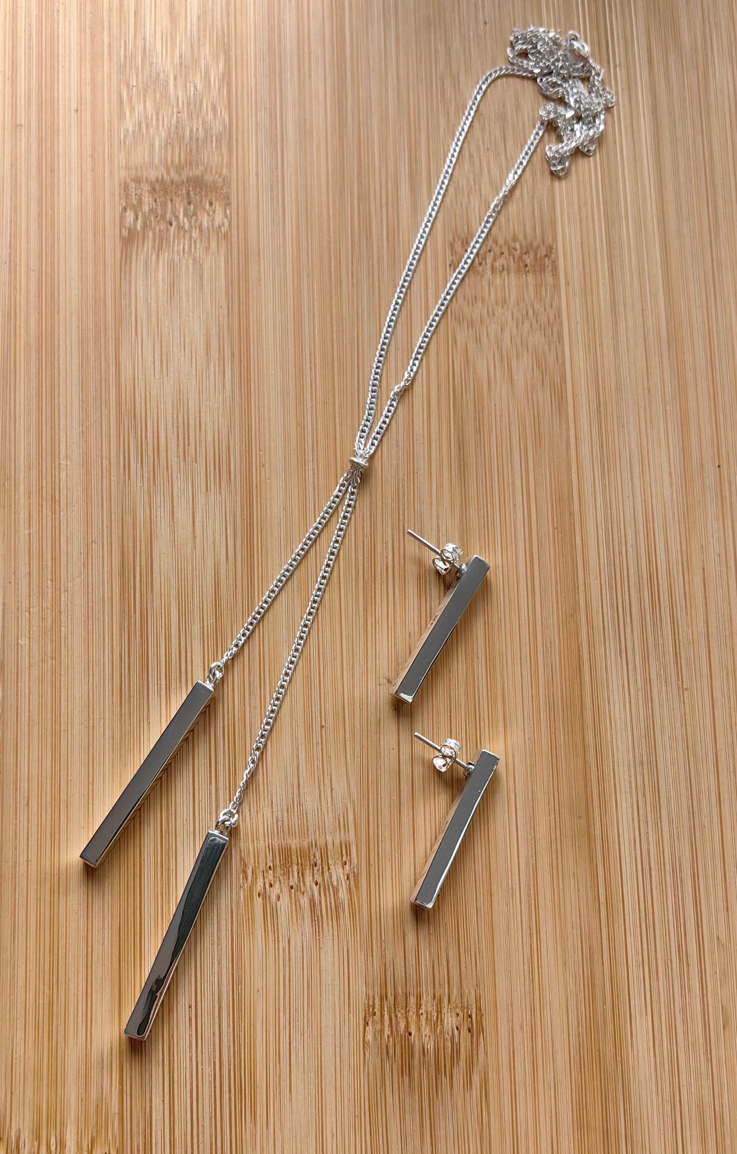 Corbatero palitos y Aretes de Plata.925